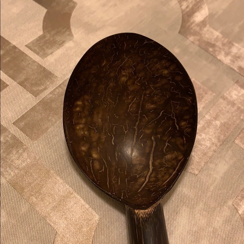 Coconut carved ladle, brown. Made in Colombia.